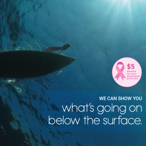 Looking up at a surfer from underwater , seeing the bottom of their surfboard with their arms paddling and a text overlay saying whats going on below the surface for breast cancer awareness