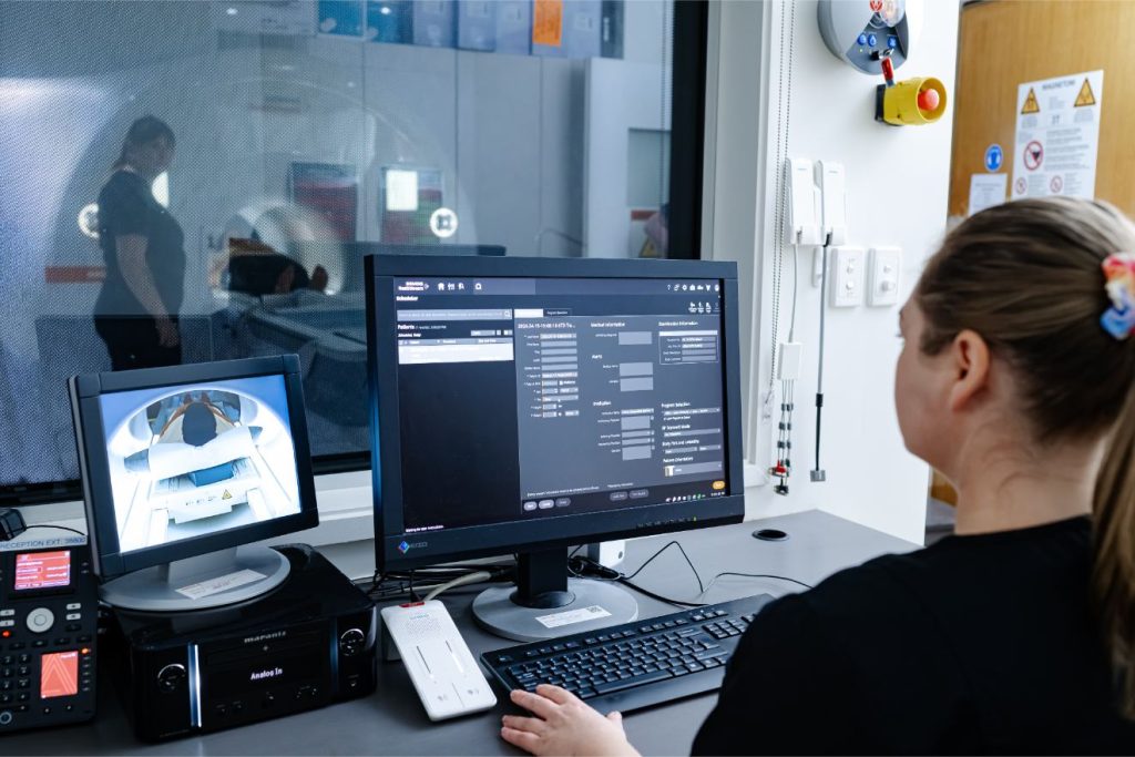 CT Radiographers prepares to scan patient for Interventional Radiology procedure at Central Queensland Radiology