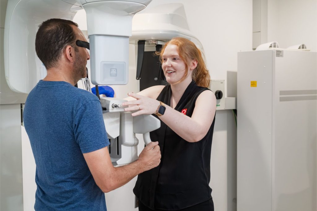 Radiographer positions patient for OPG Dental Imaging at Central Queensland Radiology