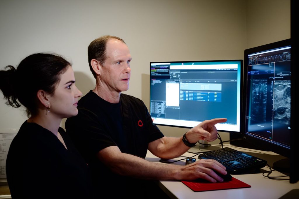 Radiologist discusses interventional scan requirements with radiographer at Central Queensland Radiography